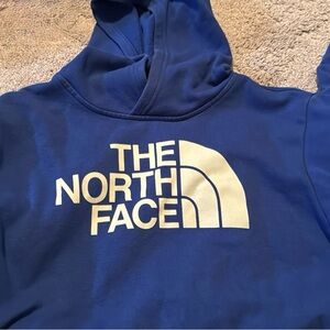The North Face Royal Blue Hoodie with Cream Logo